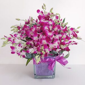 Posh Purple Orchids On Top of Short Vase for Sharjah
