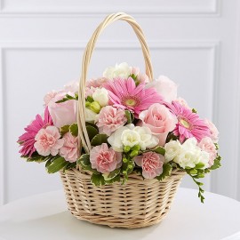 mixed pink flowers basket
