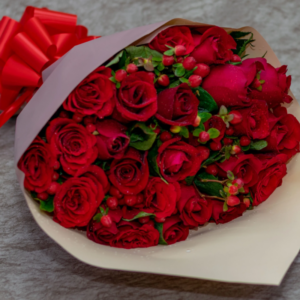red roses berry bouquet