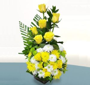 yellow white flower arrangement