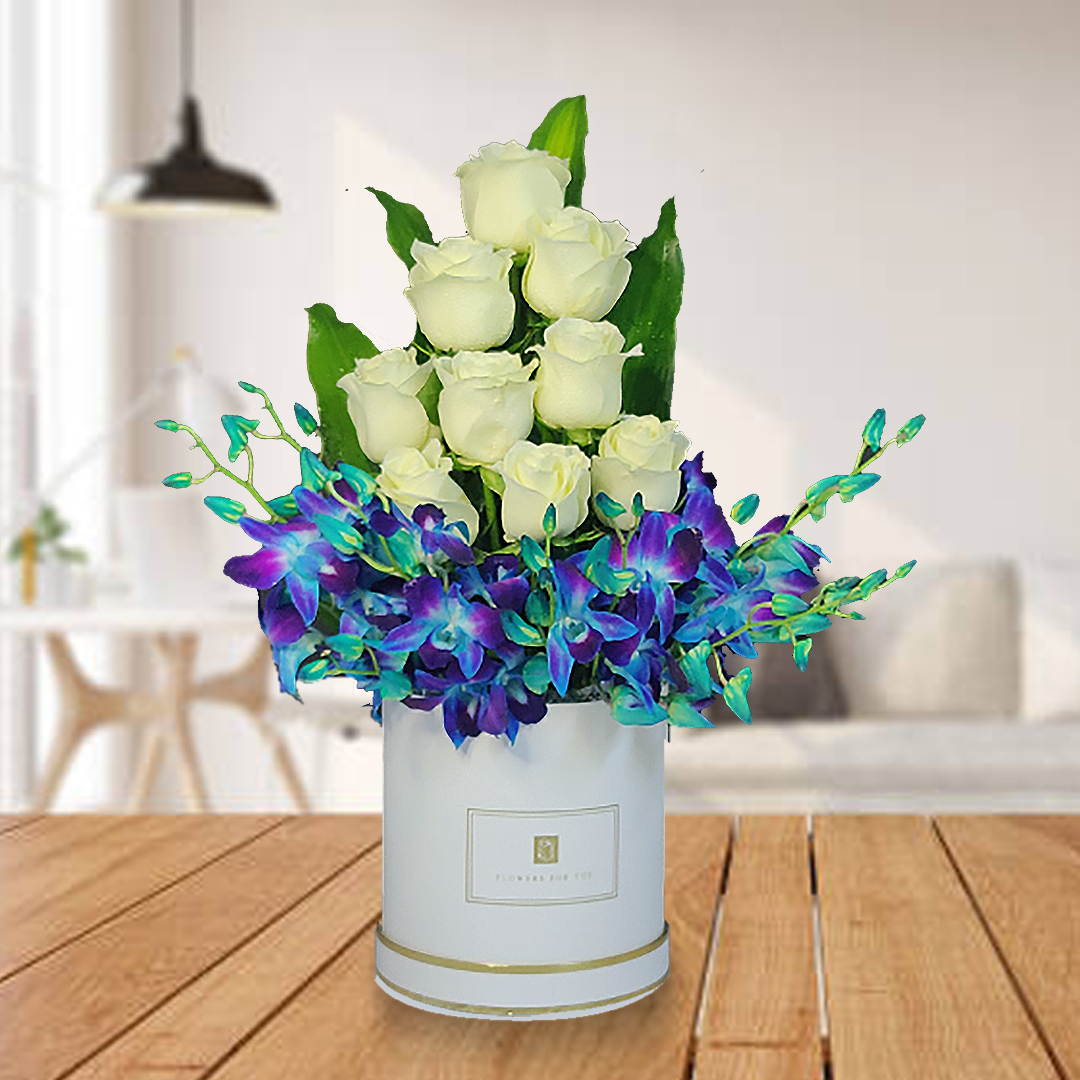 white roses blue orchids