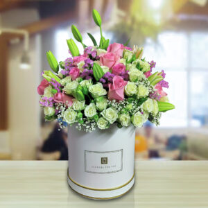 pastel color spray roses in a flower box arrangement