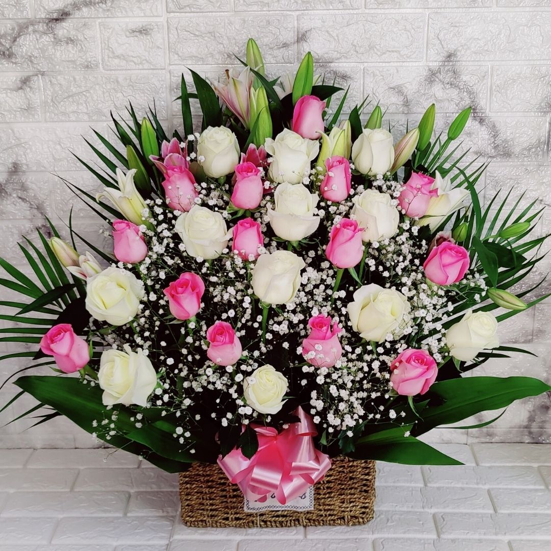 pink white flower basket